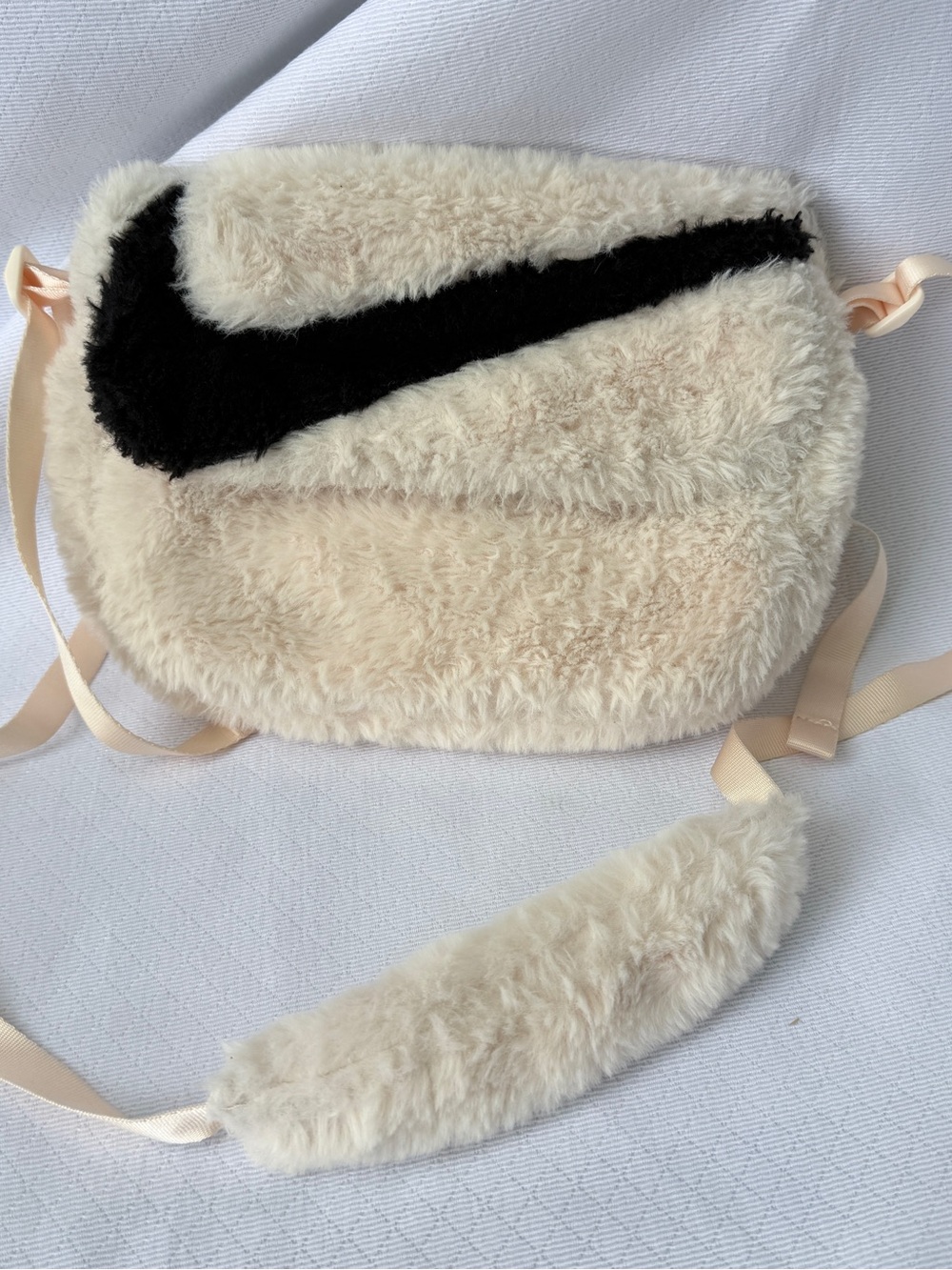 Nike Cream Faux Fur Crossbody Bag with Black Swoosh